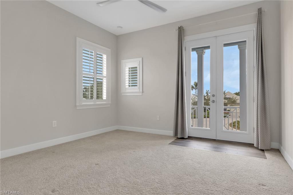 6482 Warwick Avenue Naples, FL 34113 - Photo 35 of 50 an empty room with windows