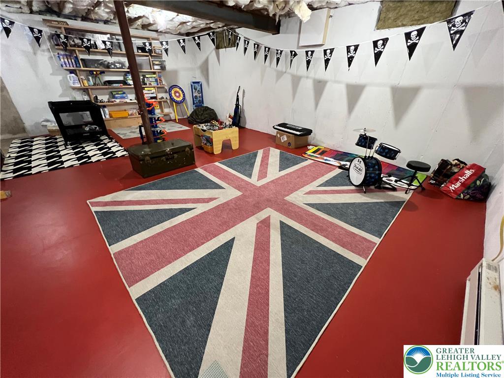 28 Harrison Street Emmaus, PA 18049 - Photo 11 of 15 a room with musical instruments