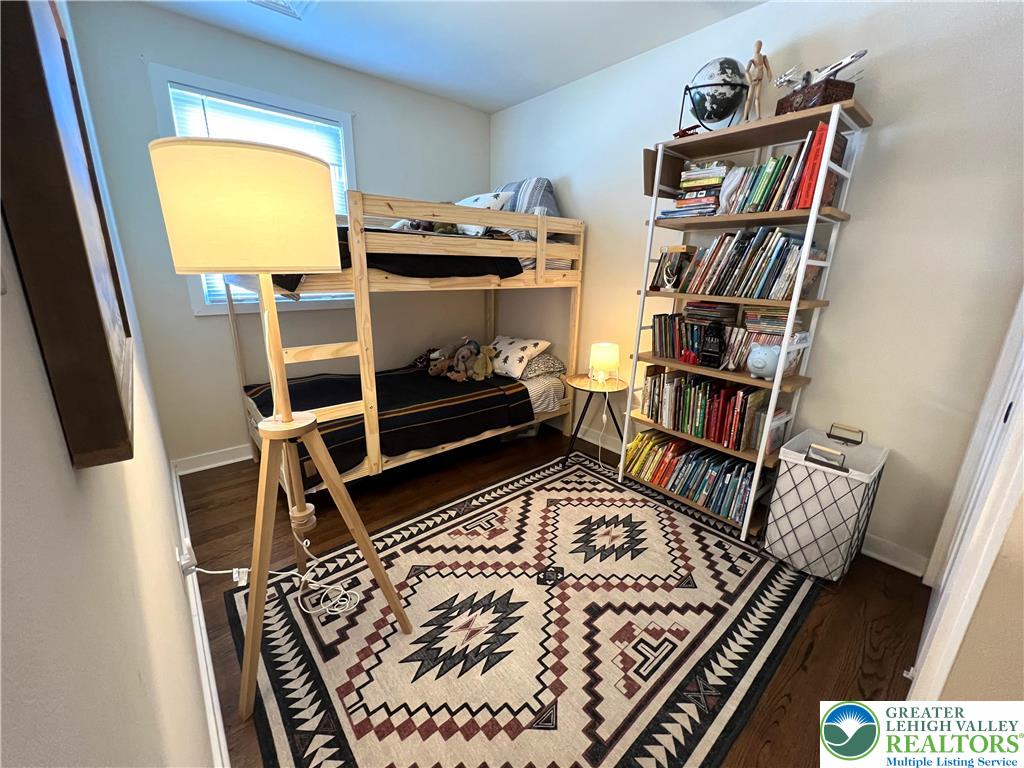 28 Harrison Street Emmaus, PA 18049 - Photo 9 of 15 a living room with baby furniture and a book shelf