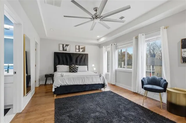 a bed room with a bed window and a couch