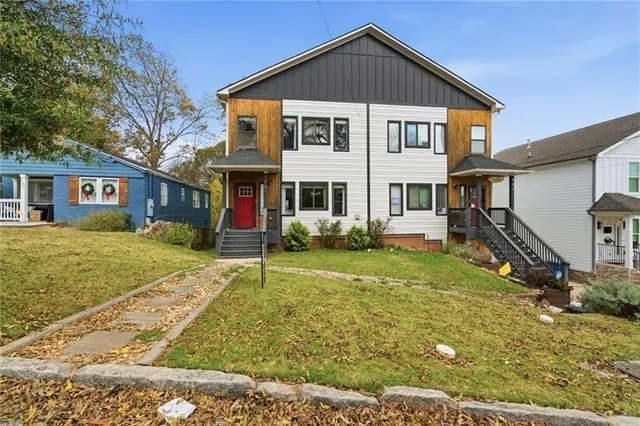 front view of a house with a yard