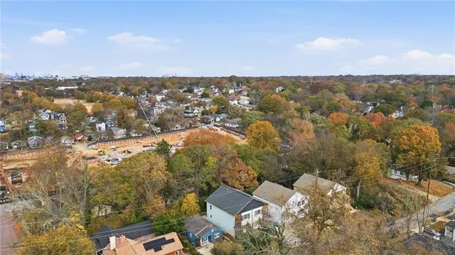 an aerial view of residential building with parking space
