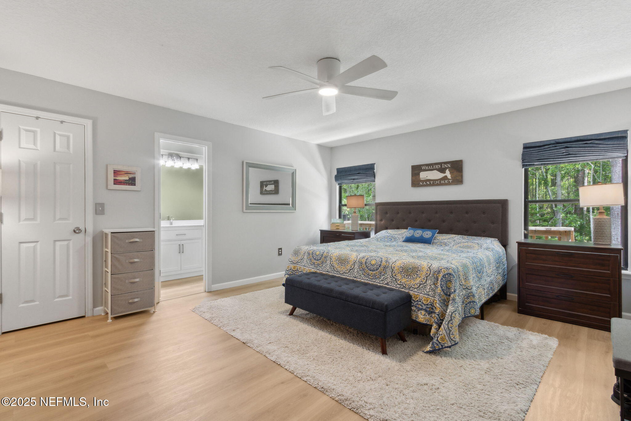 944 North Lilac Loop St. Johns, FL 32259 - Photo 19 of 55 a bedroom with a large bed and a window