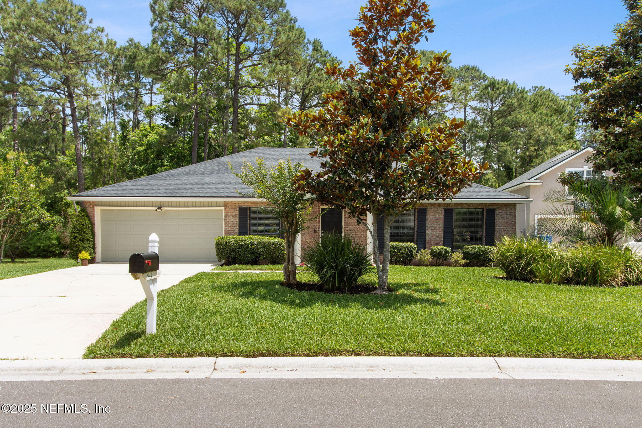 944 North Lilac Loop St. Johns, FL 32259 - Photo 2 of 55 a view of a house with a yard