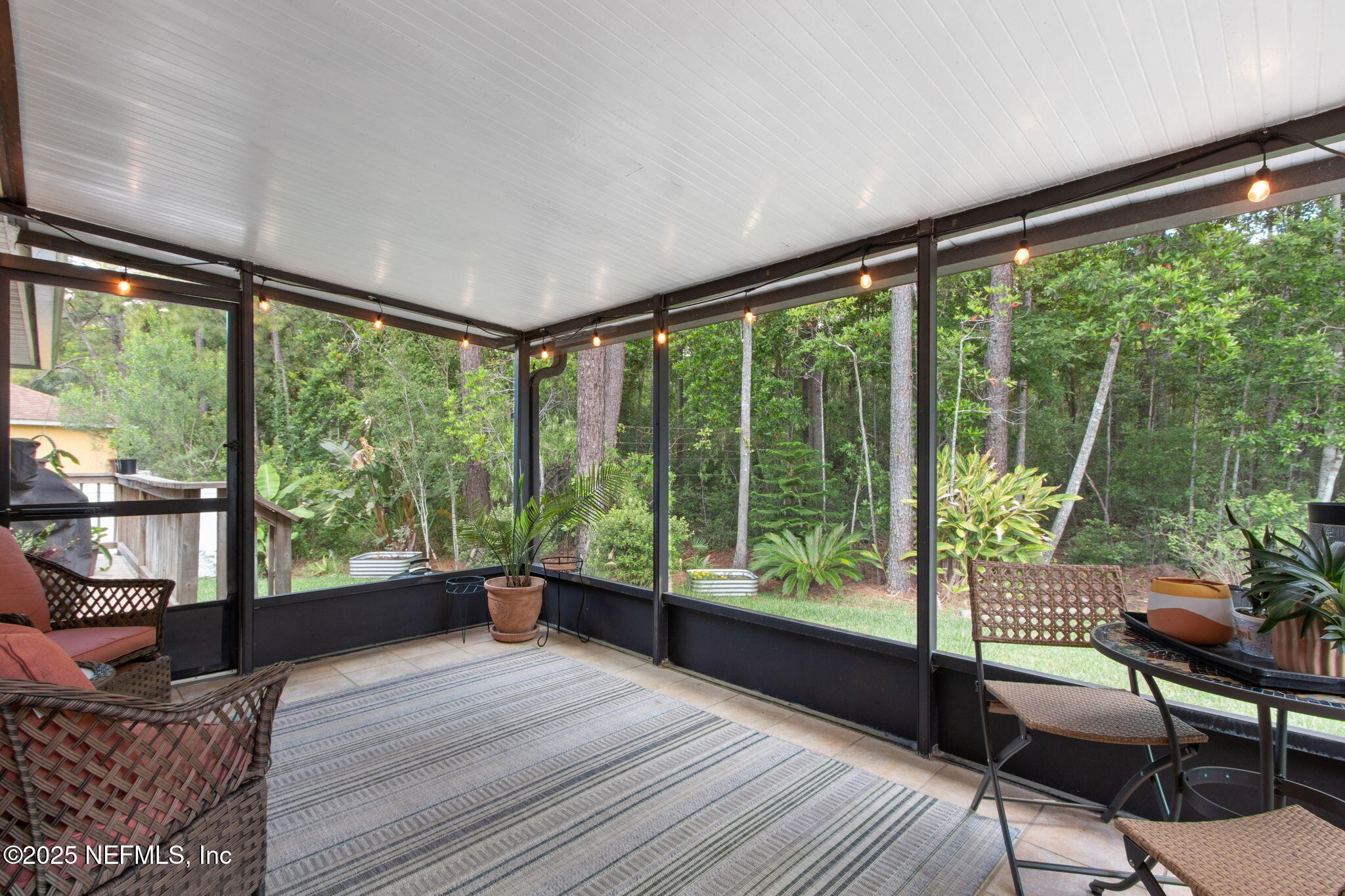 944 North Lilac Loop St. Johns, FL 32259 - Photo 33 of 55 a view of a room with wooden floor and outdoor view