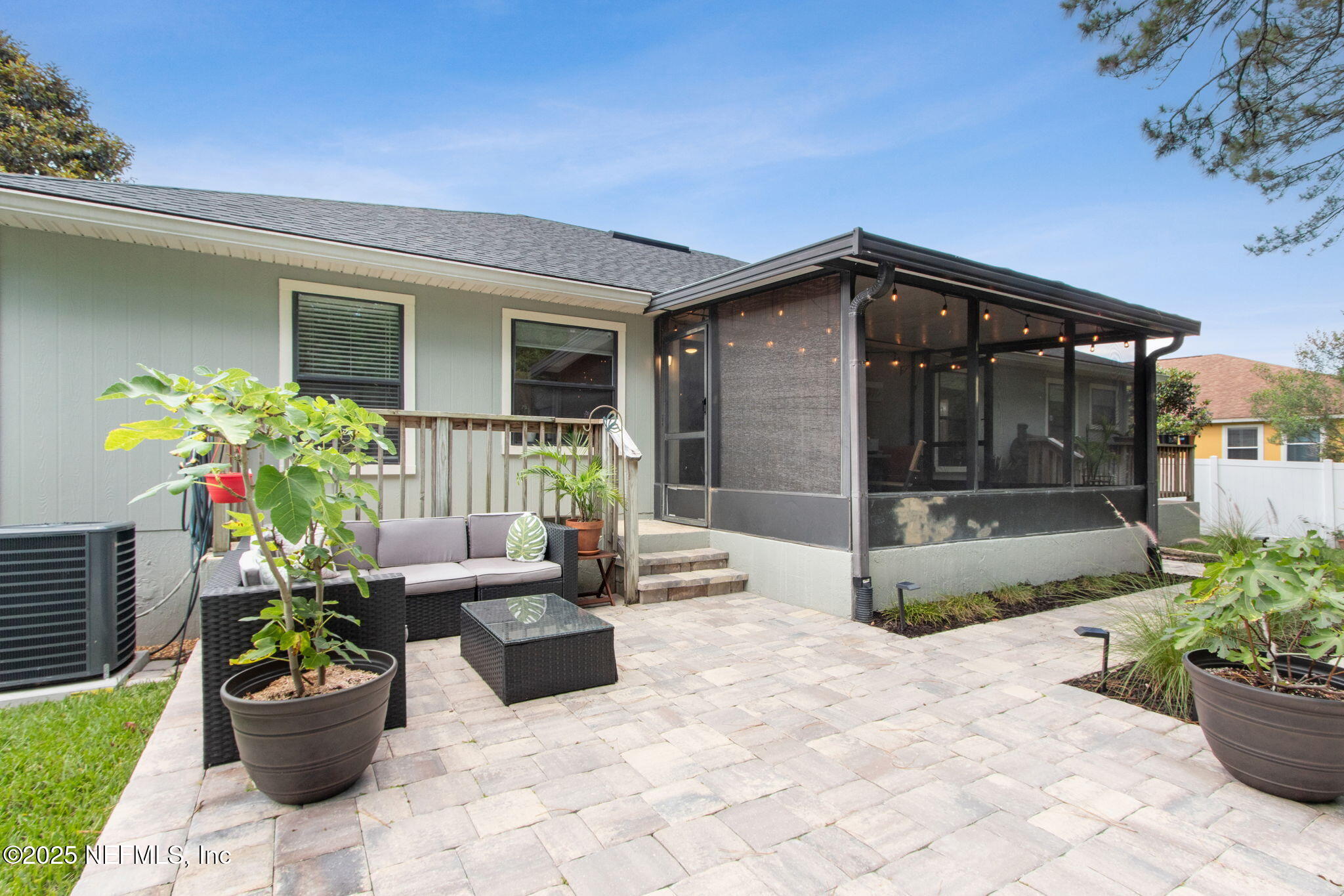 944 North Lilac Loop St. Johns, FL 32259 - Photo 36 of 55 a view of a chair and table in the patio