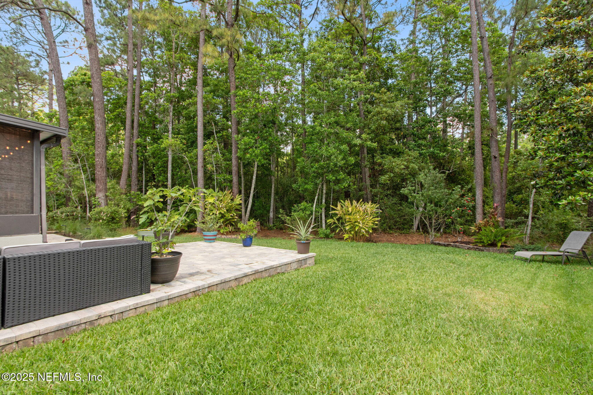 944 North Lilac Loop St. Johns, FL 32259 - Photo 39 of 55 a view of a backyard with sitting area