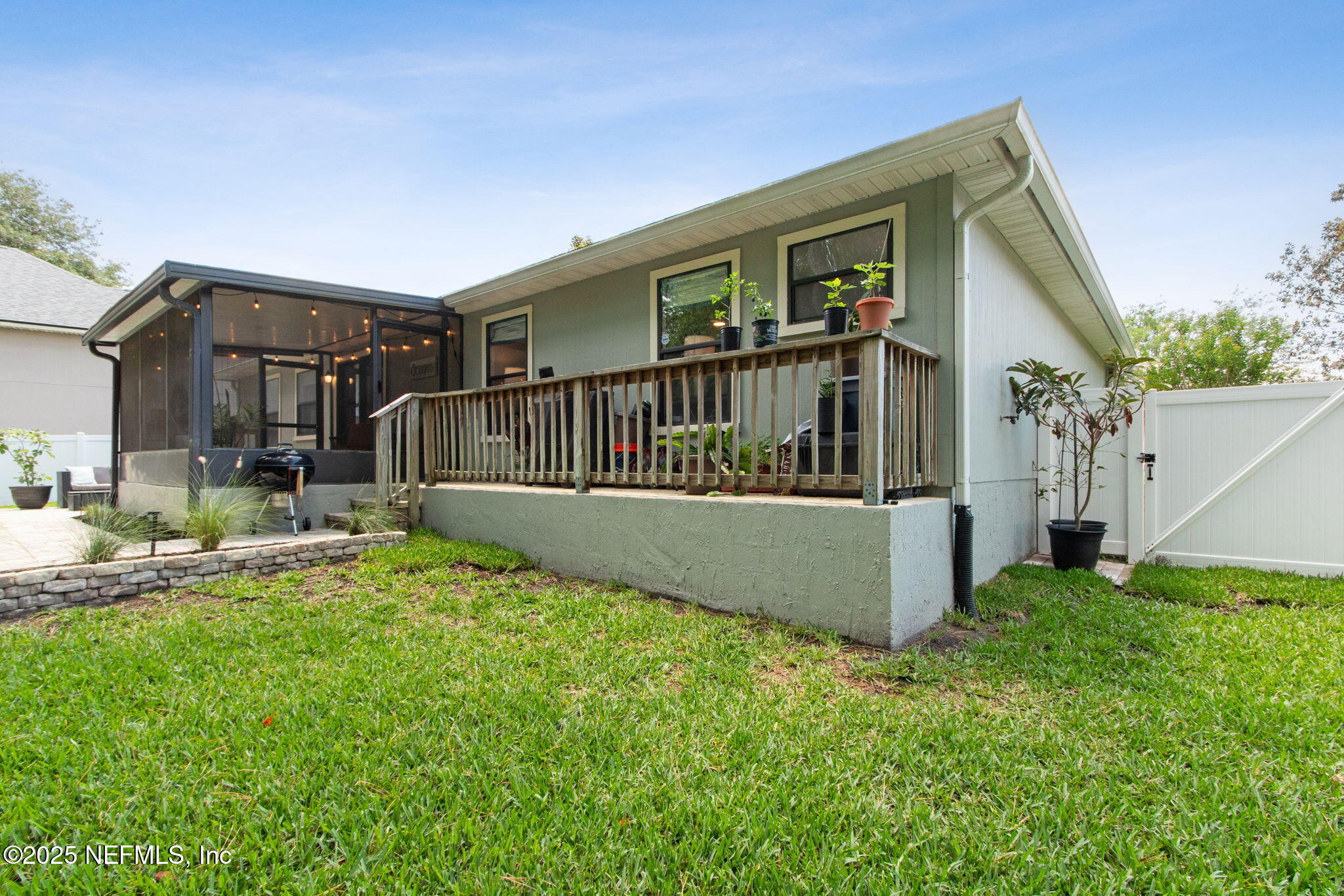 944 North Lilac Loop St. Johns, FL 32259 - Photo 42 of 55 a view of a house with backyard and porch