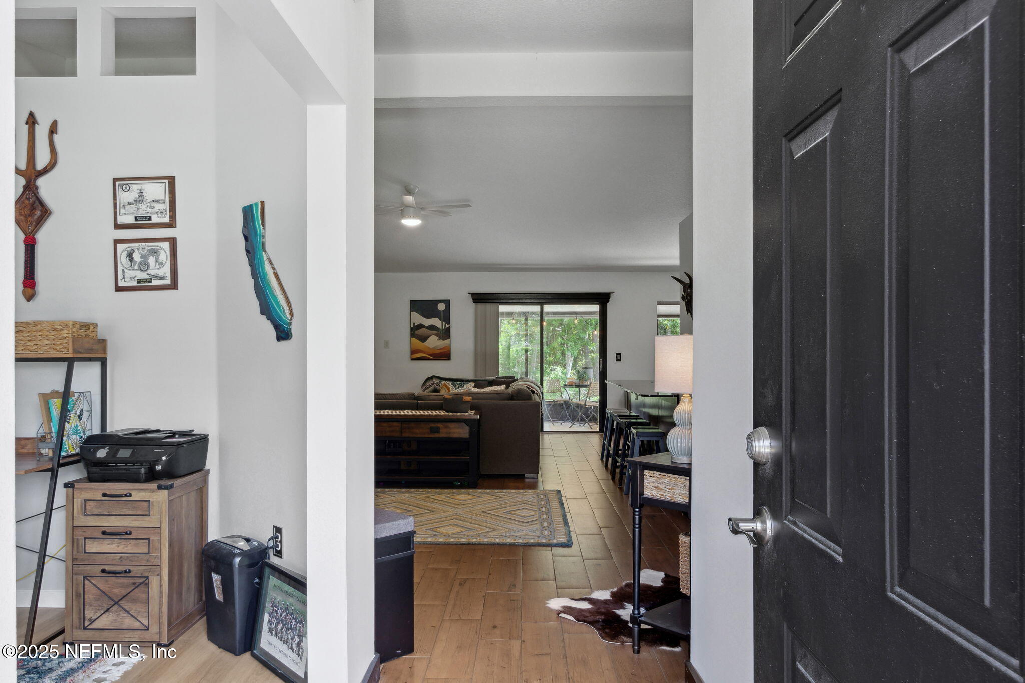 944 North Lilac Loop St. Johns, FL 32259 - Photo 5 of 55 a living room with furniture and a flat screen tv