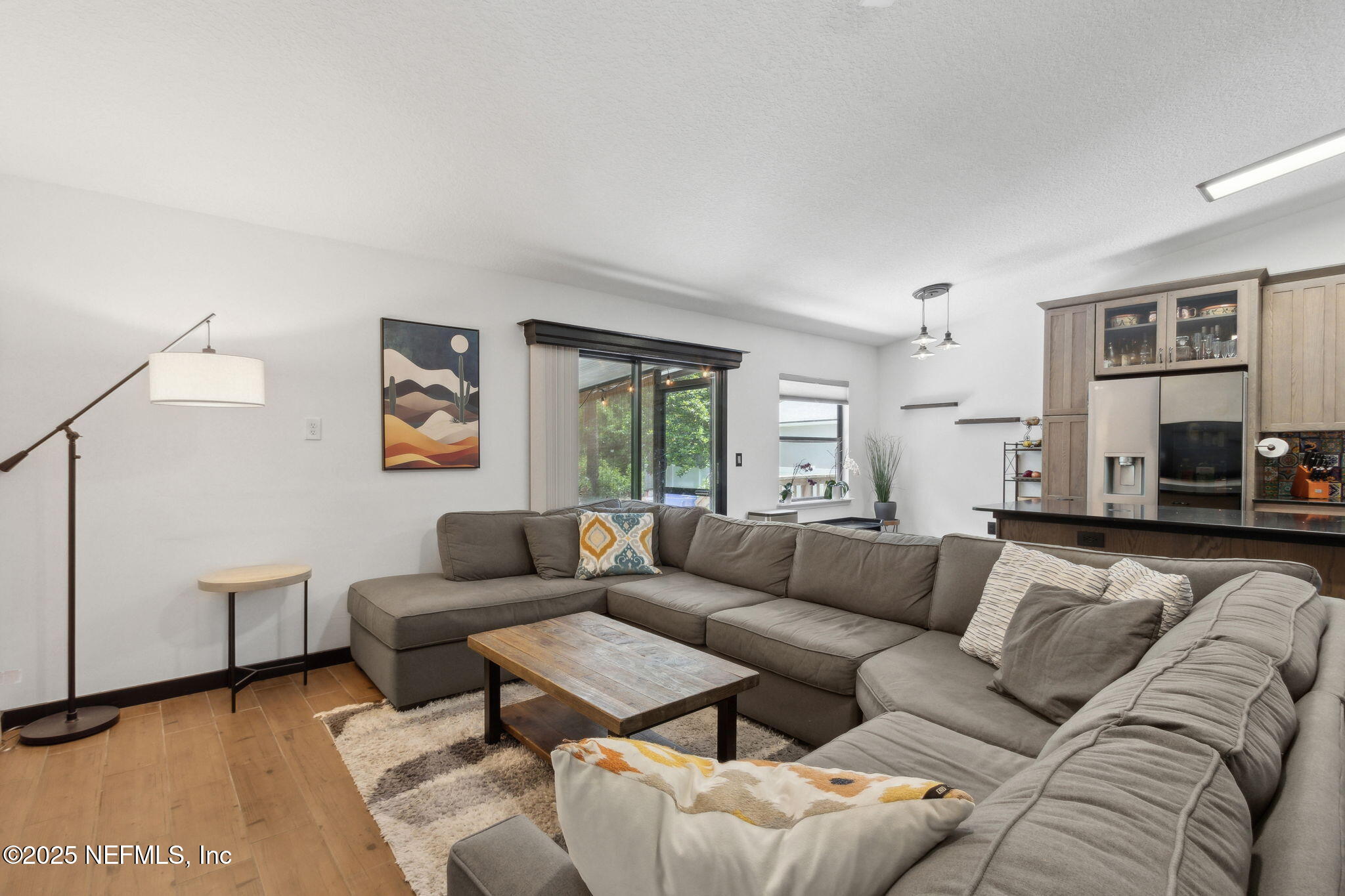 944 North Lilac Loop St. Johns, FL 32259 - Photo 8 of 55 a living room with furniture and a window
