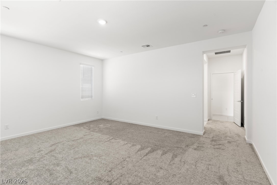 320 Isla Enclave Way Henderson, NV 89011 - Photo 20 of 49 Discover a versatile secondary living area, offering ample space and contemporary appeal.