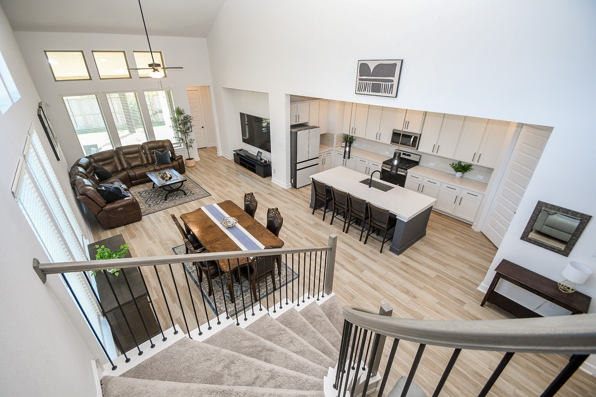 31407 Splitting Willow Lane Fulshear, TX 77441 - Photo 17 of 19 a living room with furniture and a flat screen tv