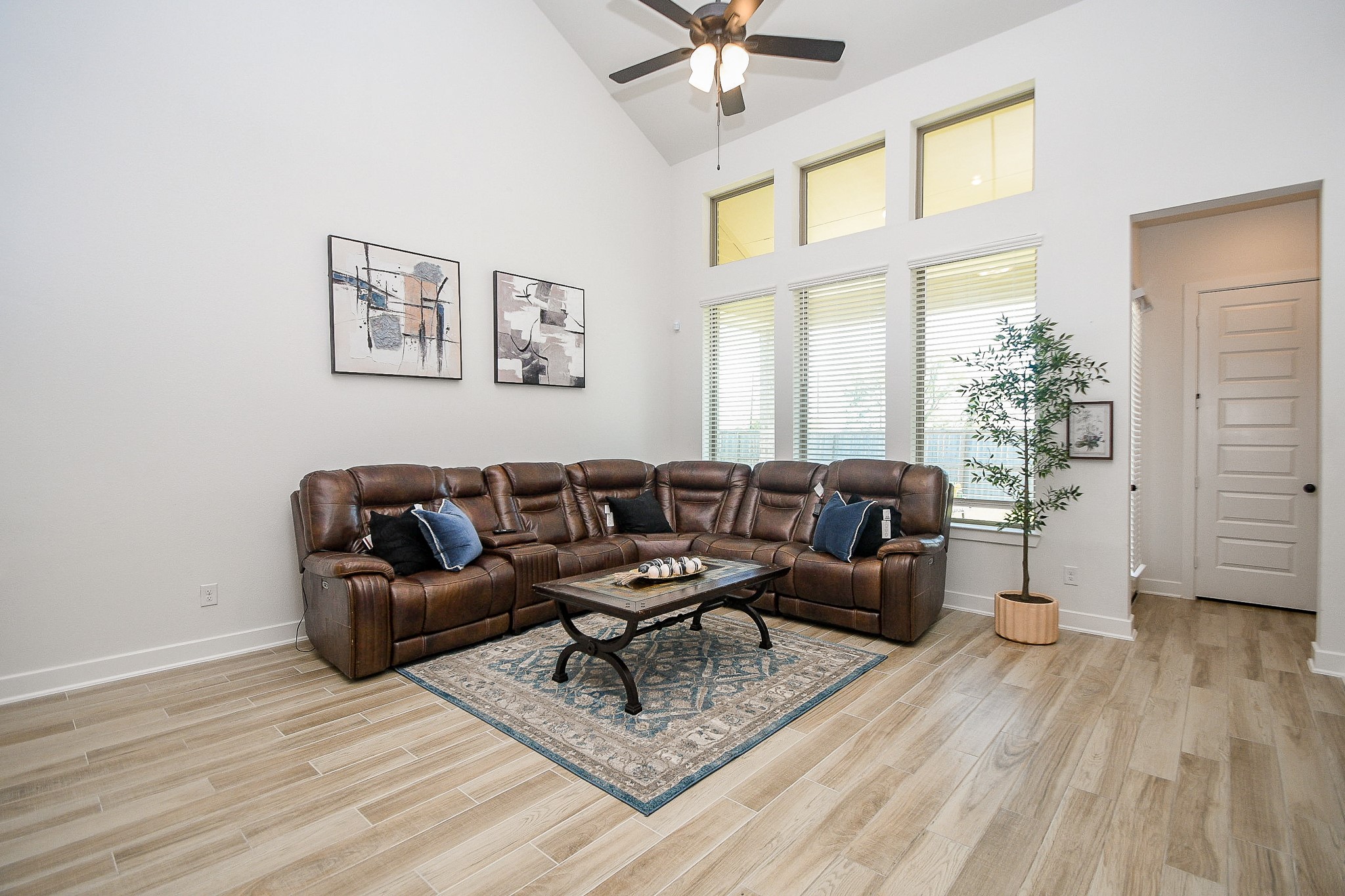 31407 Splitting Willow Lane Fulshear, TX 77441 - Photo 8 of 19 a living room with furniture and a large window