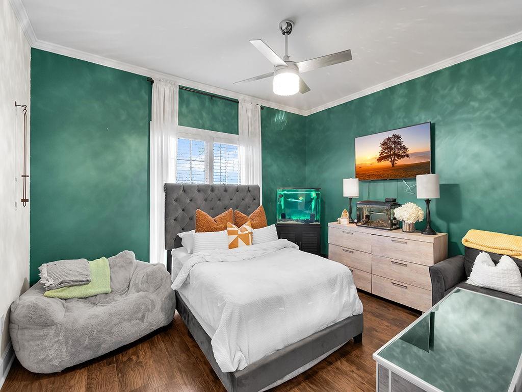 129 Preserve Parkway Ball Ground, GA 30107 - Photo 21 of 76 a bedroom with two beds and a painting on the wall