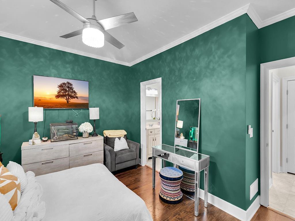 129 Preserve Parkway Ball Ground, GA 30107 - Photo 22 of 76 a living room with furniture and a flat screen tv