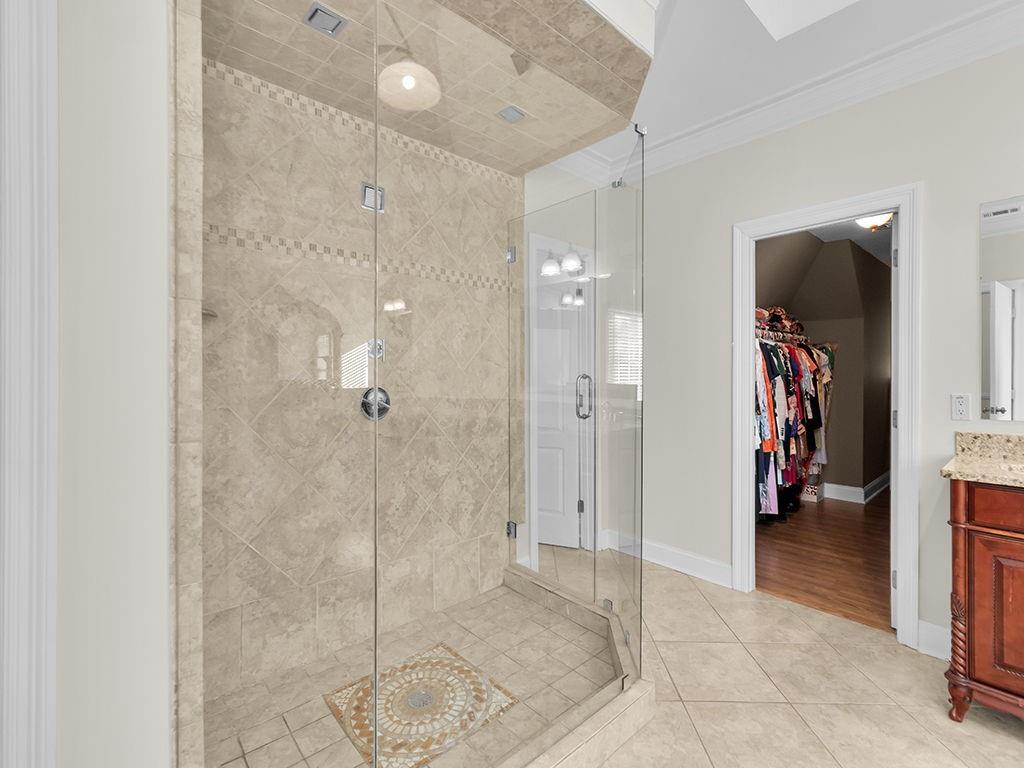 129 Preserve Parkway Ball Ground, GA 30107 - Photo 32 of 76 a bathroom with a shower