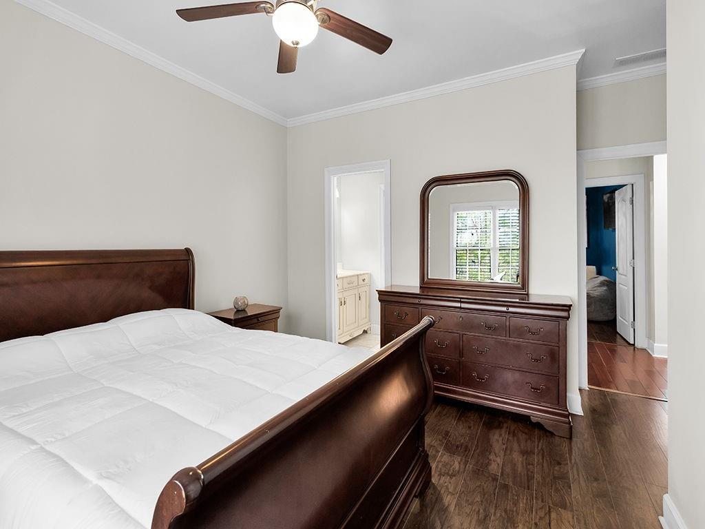 129 Preserve Parkway Ball Ground, GA 30107 - Photo 41 of 76 a bedroom with a bed and a large window