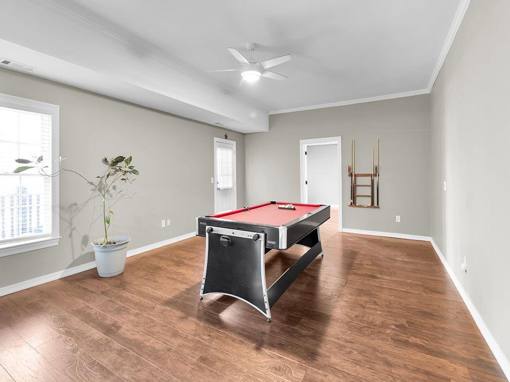 129 Preserve Parkway Ball Ground, GA 30107 - Photo 55 of 76 a living room with furniture and a large window