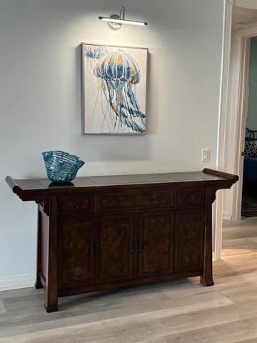 a view of a wooden floor with a table