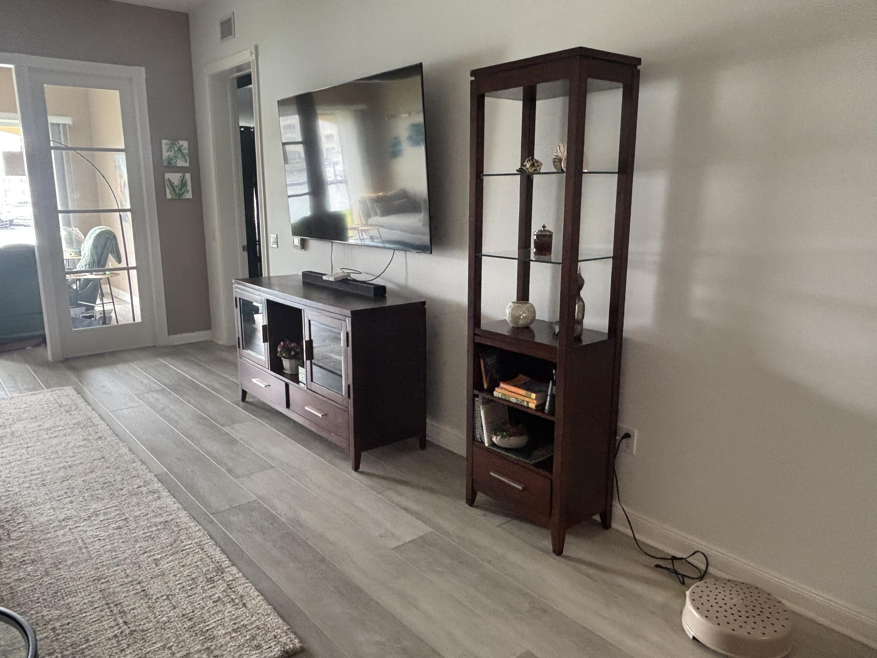 9 Harbour Isle Drive East, Unit 102 Fort Pierce, FL 34949 - Photo 13 of 30 a view of living room with furniture and window