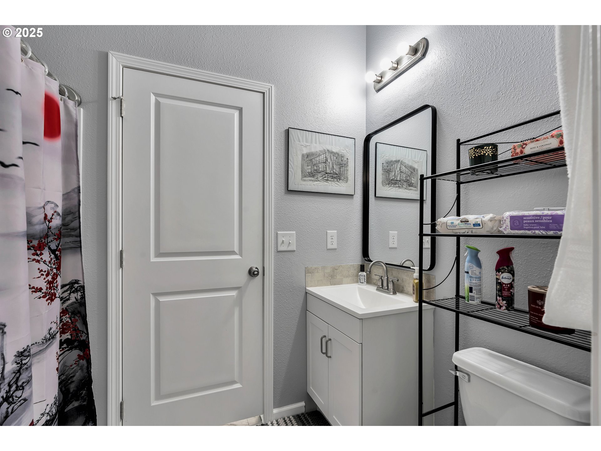 8750 Southeast 155th Avenue, Unit 28 Happy Valley, OR 97086 - Photo 14 of 28 a bathroom with a sink vanity and mirror