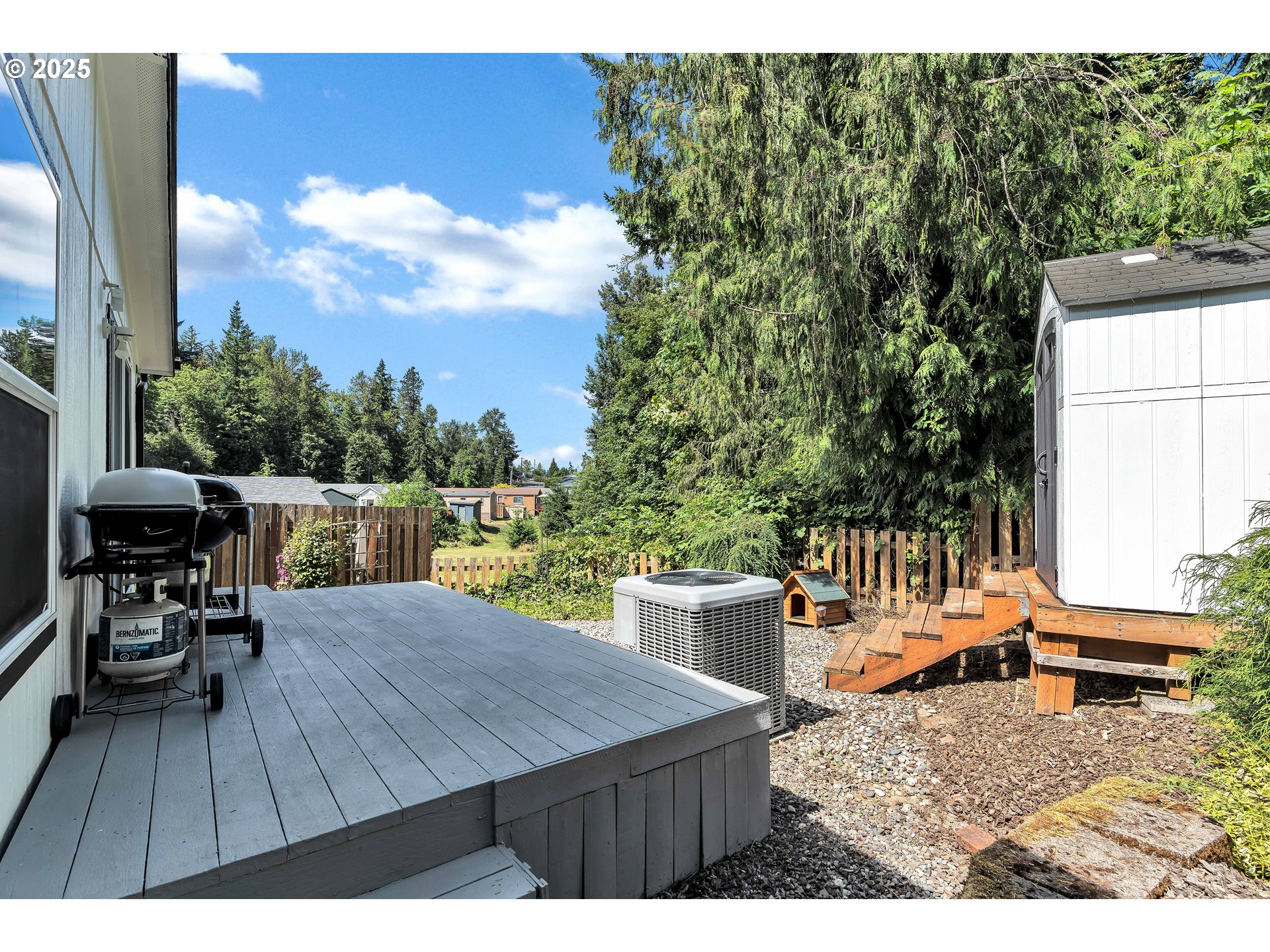 8750 Southeast 155th Avenue, Unit 28 Happy Valley, OR 97086 - Photo 24 of 28 a view of a patio with wooden floor