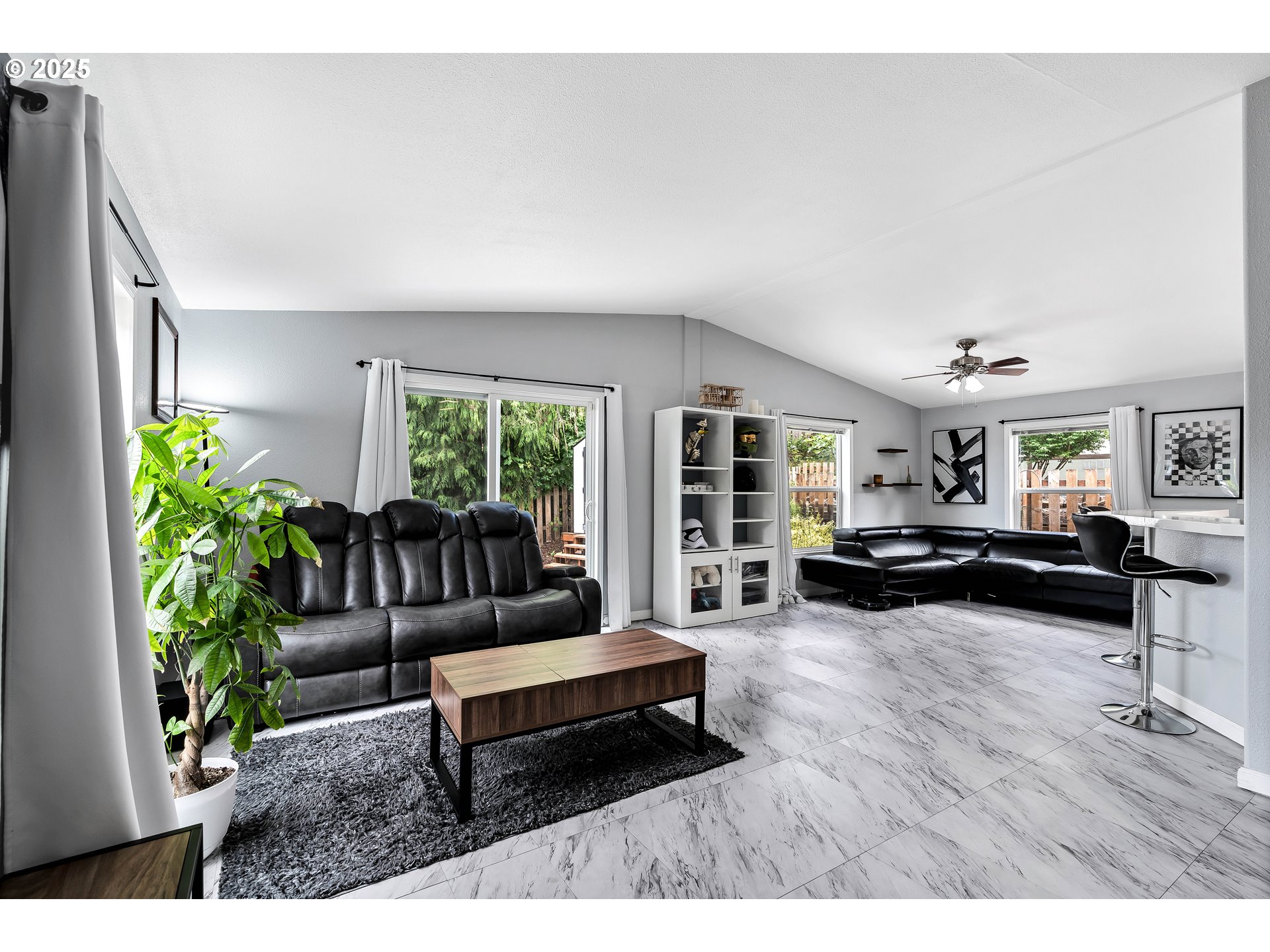 8750 Southeast 155th Avenue, Unit 28 Happy Valley, OR 97086 - Photo 5 of 28 a living room with furniture and a wooden floor