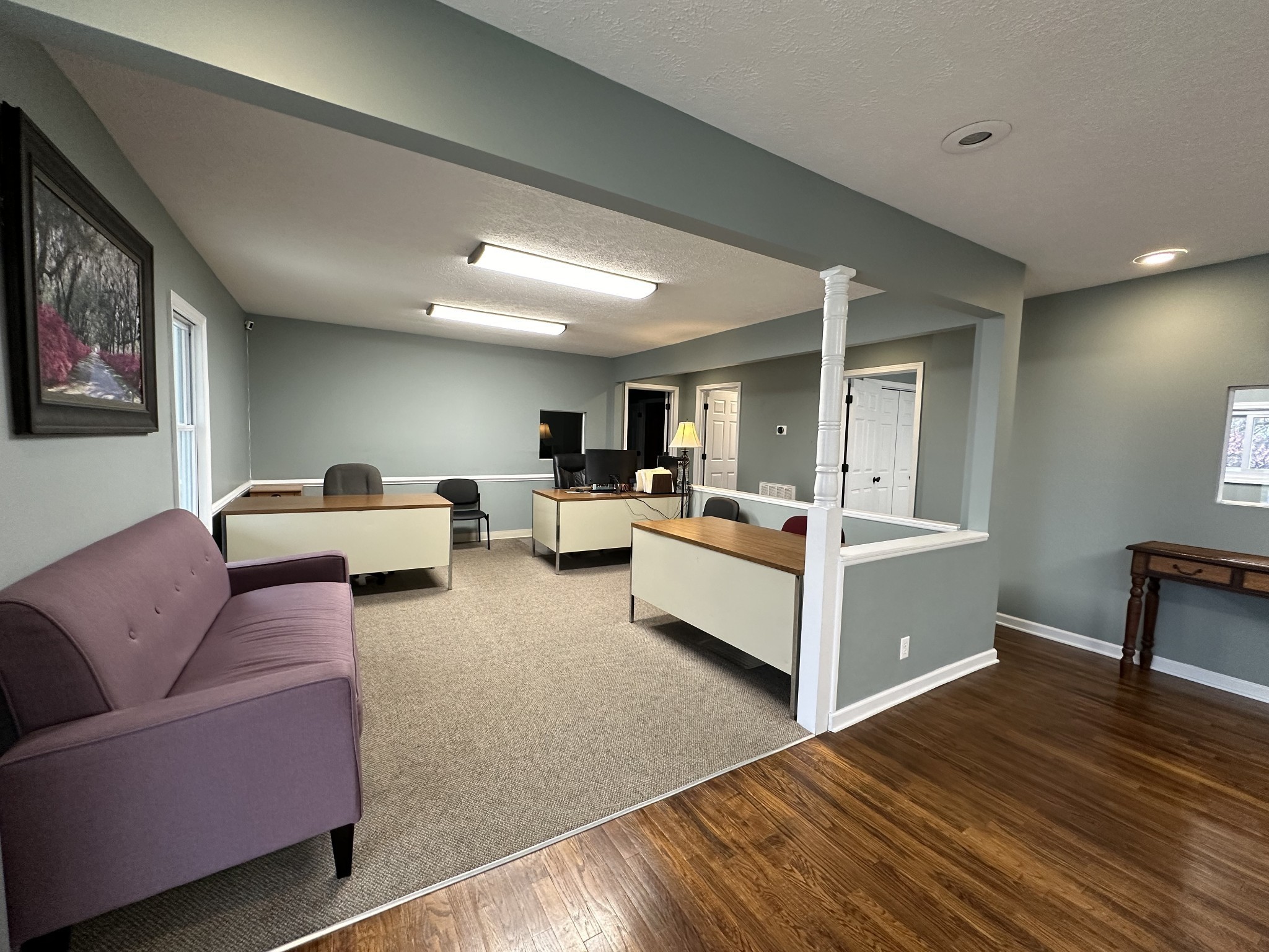 5652 Highway 100 Lyles, TN 37098 - Photo 14 of 21 a living room with furniture kitchen view and a wooden floor