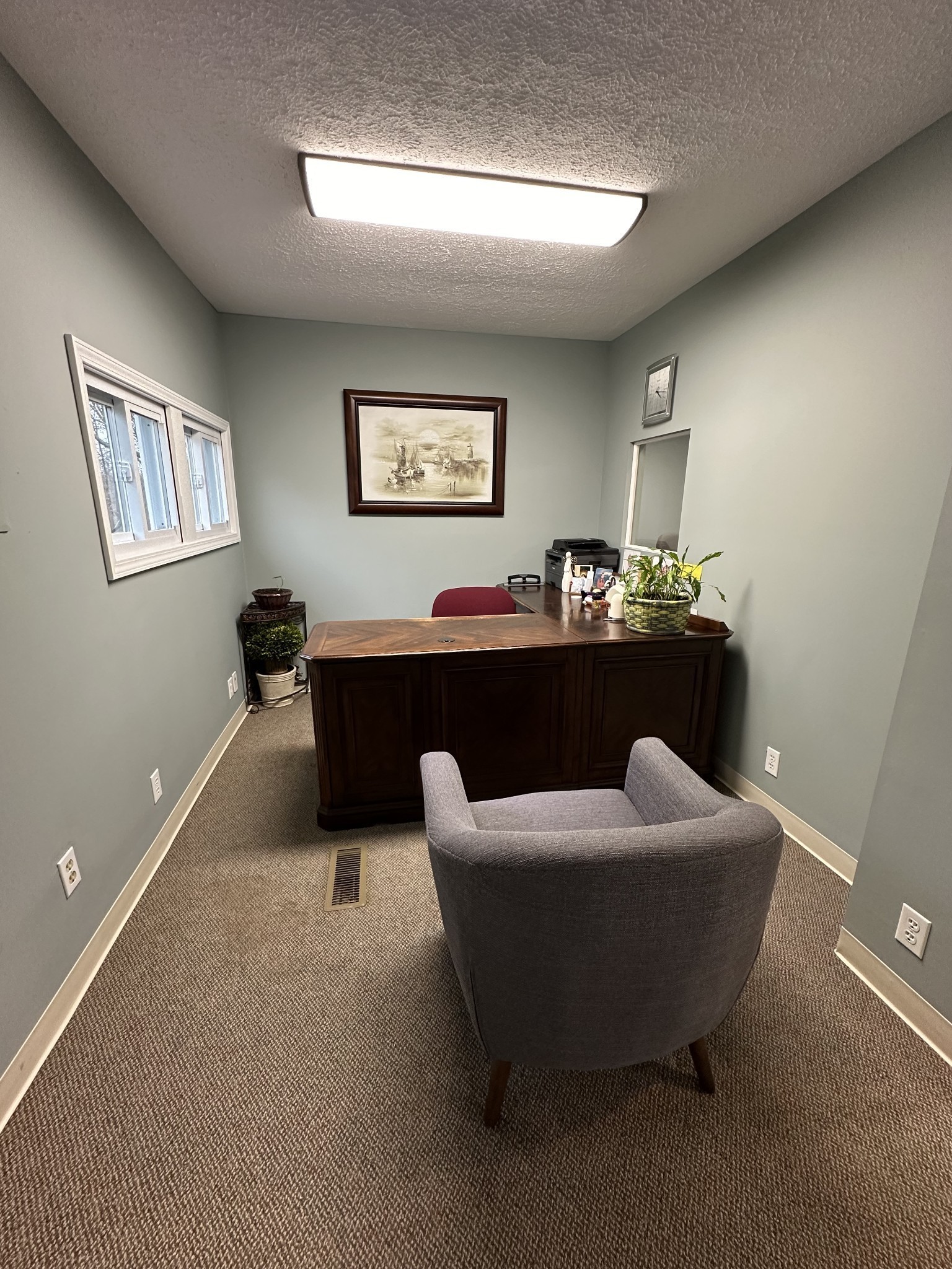 5652 Highway 100 Lyles, TN 37098 - Photo 17 of 21 a living room with furniture and a lamp