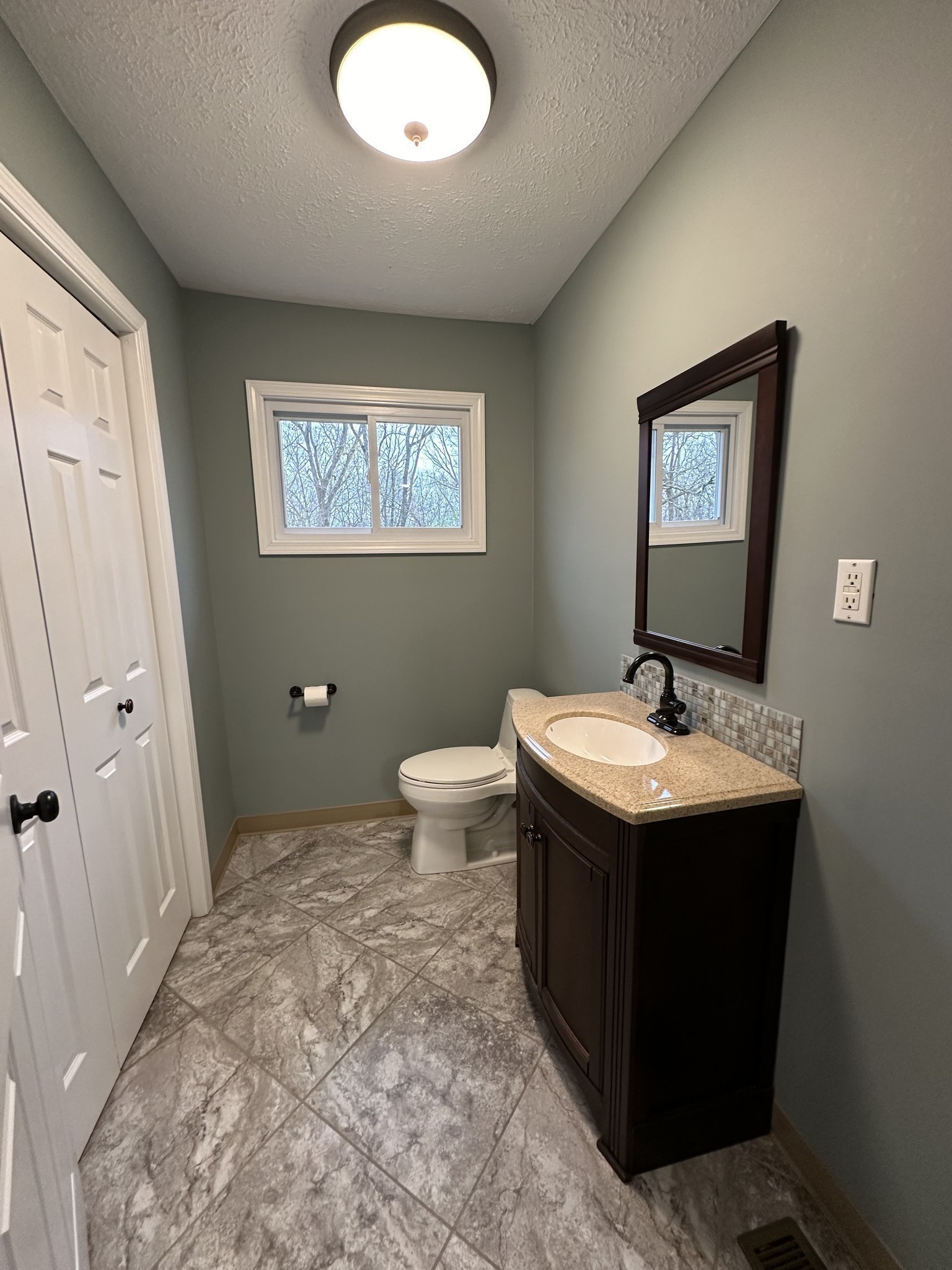 5652 Highway 100 Lyles, TN 37098 - Photo 18 of 21 a bathroom with a sink and a mirror