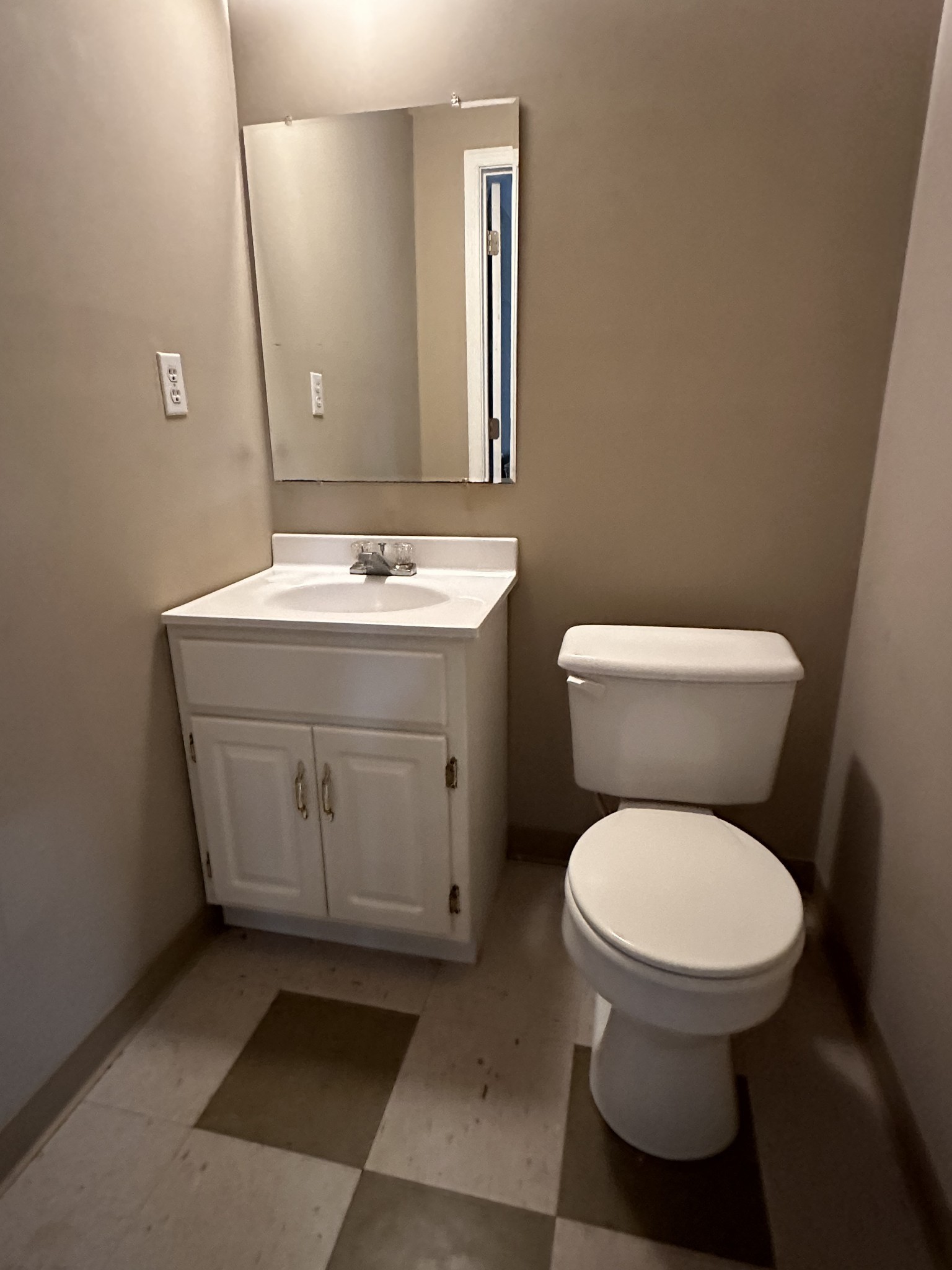 5652 Highway 100 Lyles, TN 37098 - Photo 21 of 21 a bathroom with a toilet sink and mirror