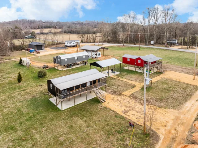 a view of swimming pool with a patio