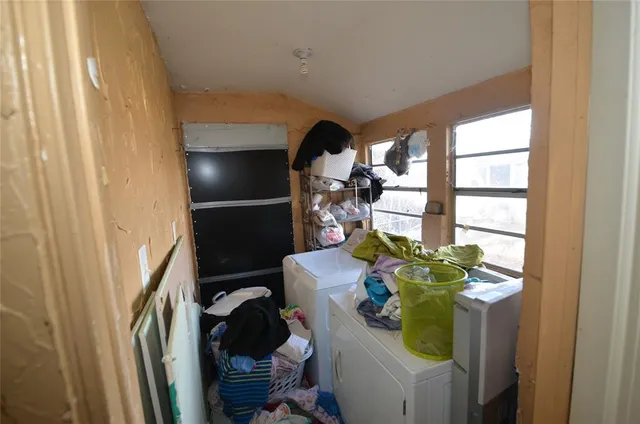 a view of a house with a tree