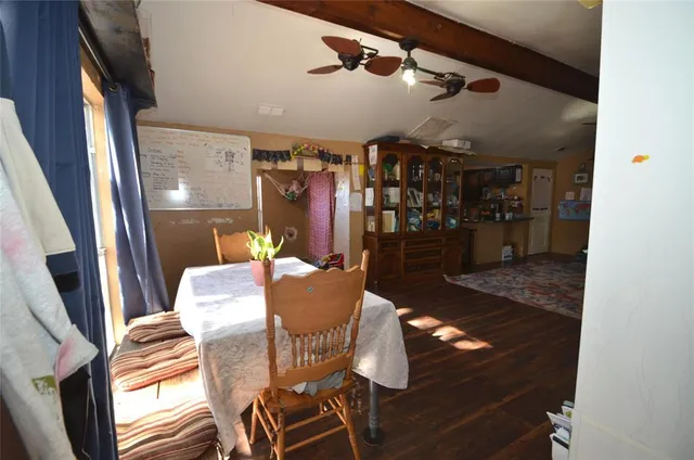 a view of a chairs and table in a room