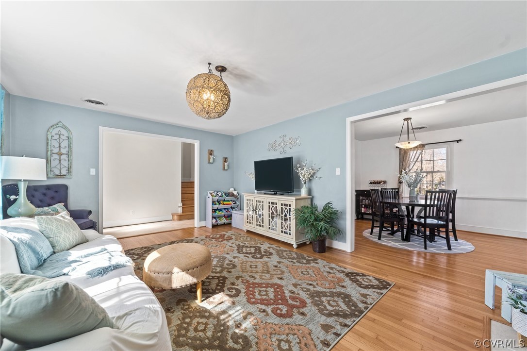 8822 Chippenham Road Richmond, VA 23235 - Photo 11 of 37 a living room with furniture and a flat screen tv