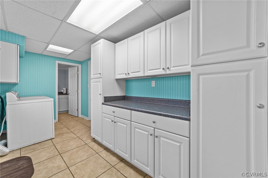 8822 Chippenham Road Richmond, VA 23235 - Photo 22 of 37 a kitchen with cabinets and white appliances