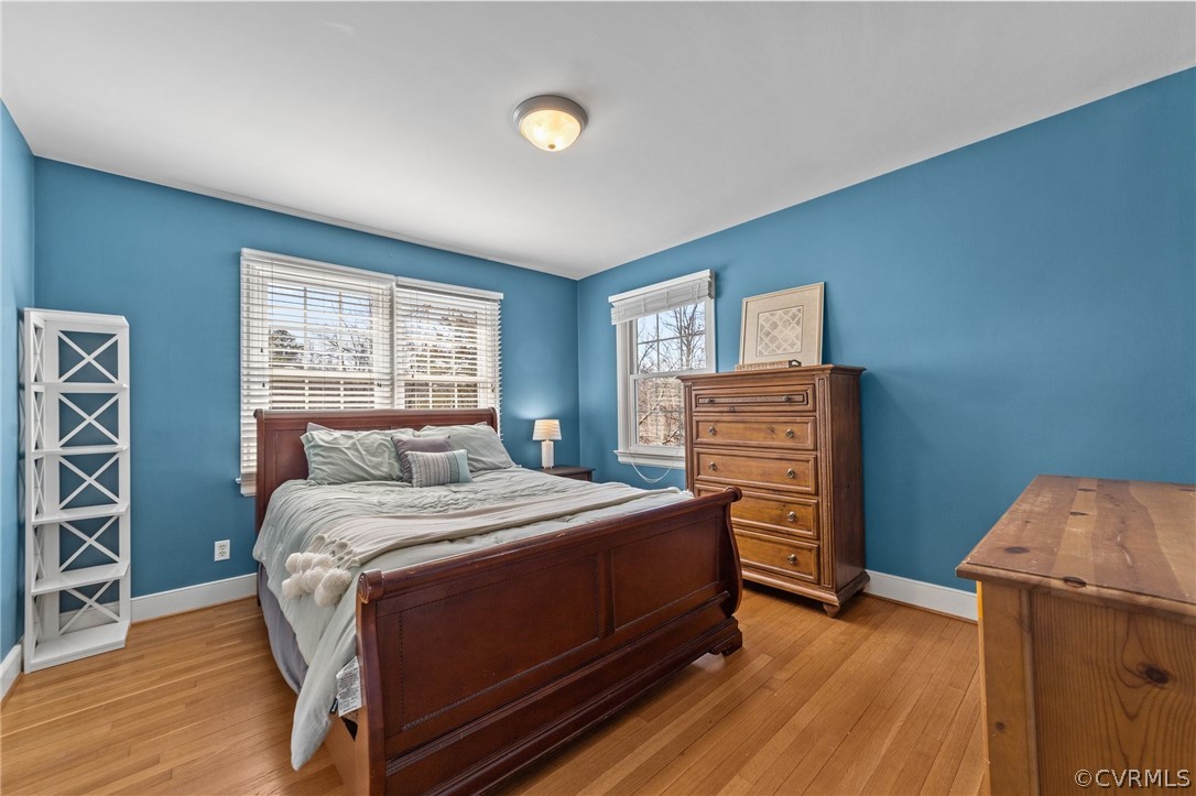 8822 Chippenham Road Richmond, VA 23235 - Photo 25 of 37 a bedroom with a bed and a dresser