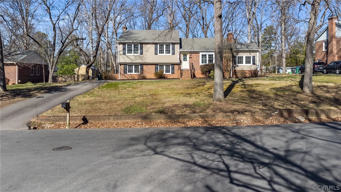 8822 Chippenham Road Richmond, VA 23235 - Photo 37 of 37 a view of a town with brick building and large tree
