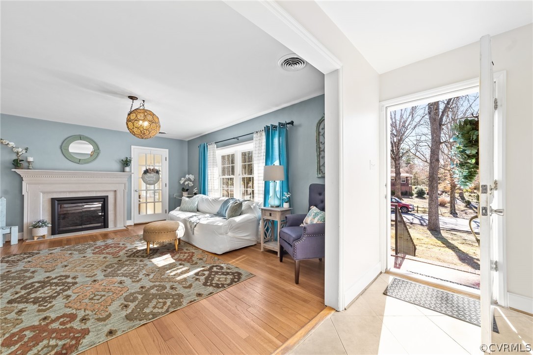 8822 Chippenham Road Richmond, VA 23235 - Photo 4 of 37 a living room with furniture and a fireplace