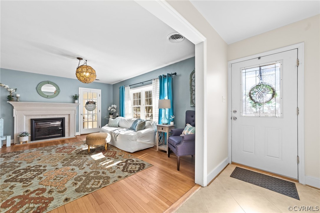 8822 Chippenham Road Richmond, VA 23235 - Photo 5 of 37 a living room with furniture and a fireplace