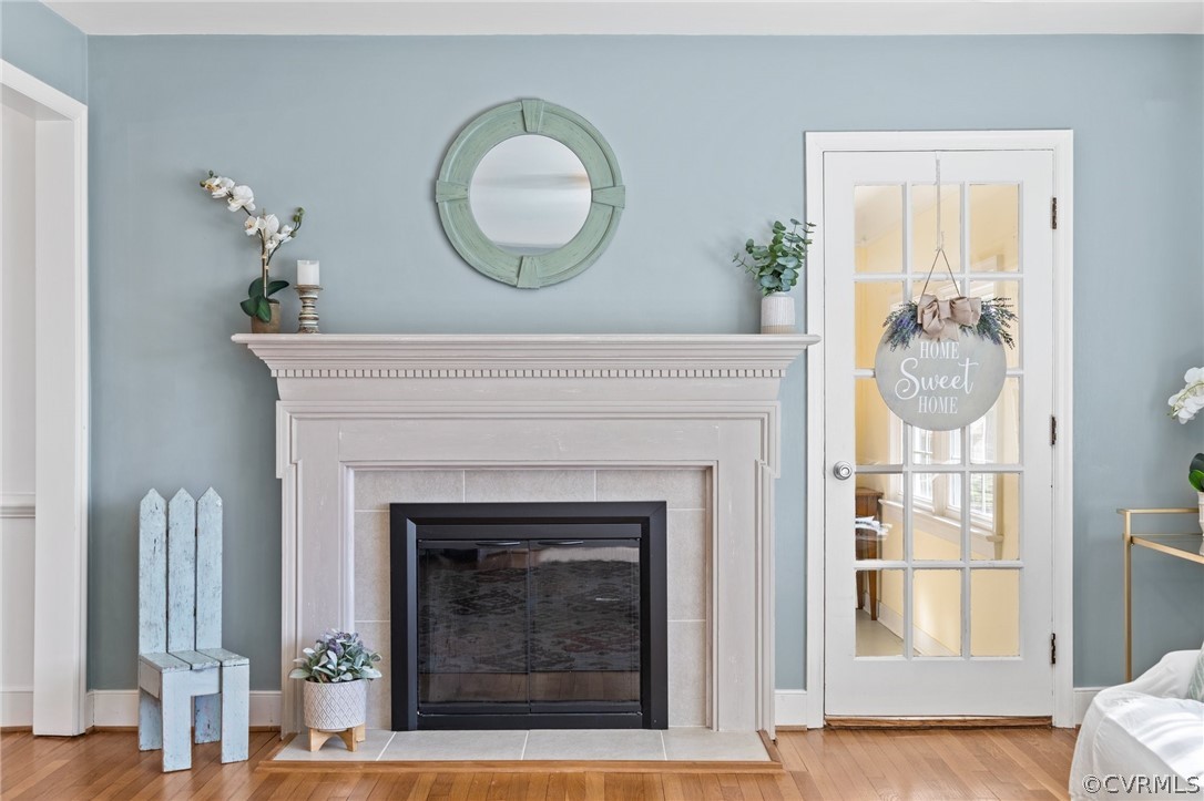 8822 Chippenham Road Richmond, VA 23235 - Photo 8 of 37 a living room with a fireplace windows and a fireplace