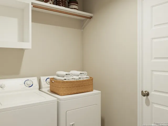 a utility room with dryer and washer