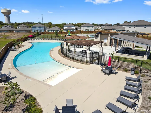 a view of a swimming pool and a terrace
