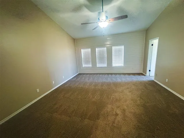 a bathroom with a sink a mirror and shower