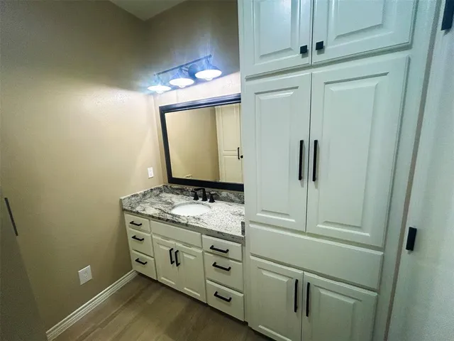 a bathroom with a toilet and a bathtub