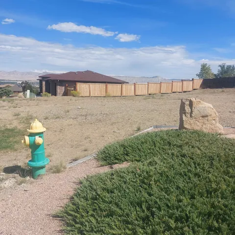 a view of a lake with a big yard