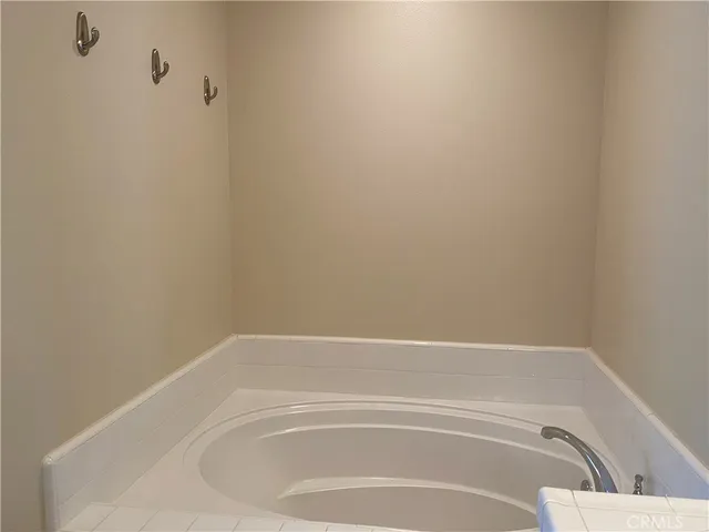a view of a bathtub in a bathroom