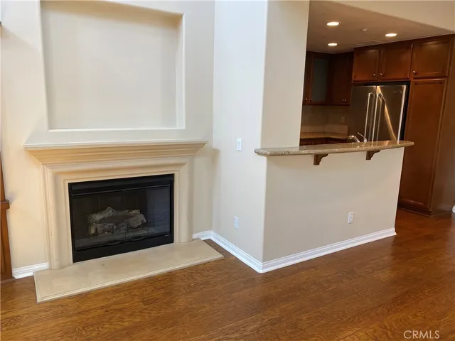 a living room with a fireplace