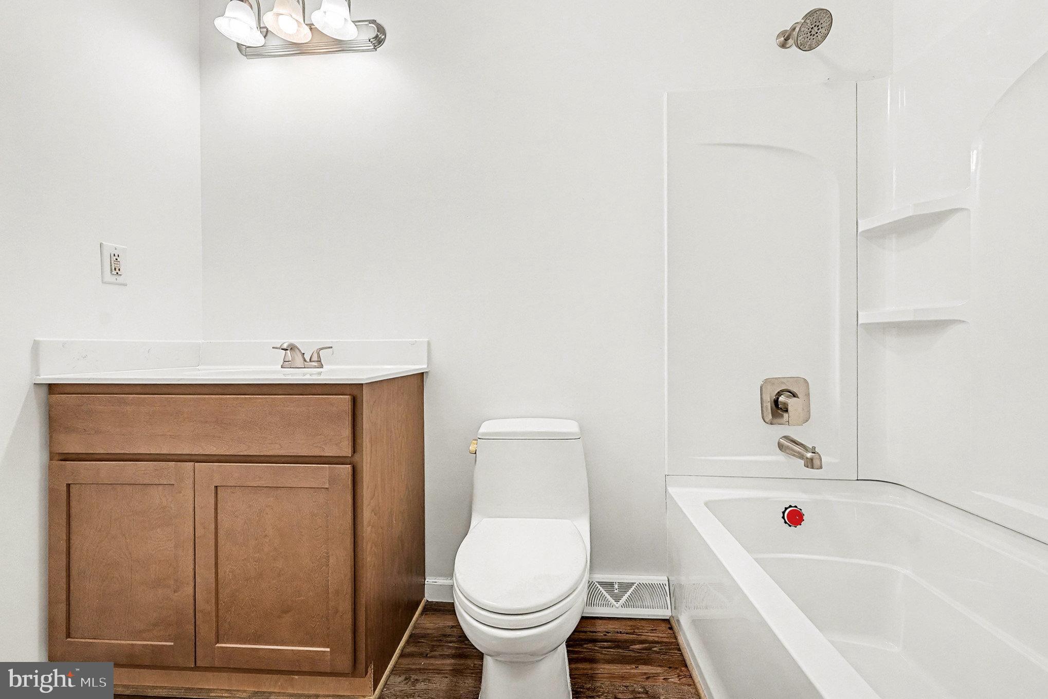 4127 Cabin Road Reva, VA 22735 - Photo 15 of 28 a bathroom with a sink a toilet and shower