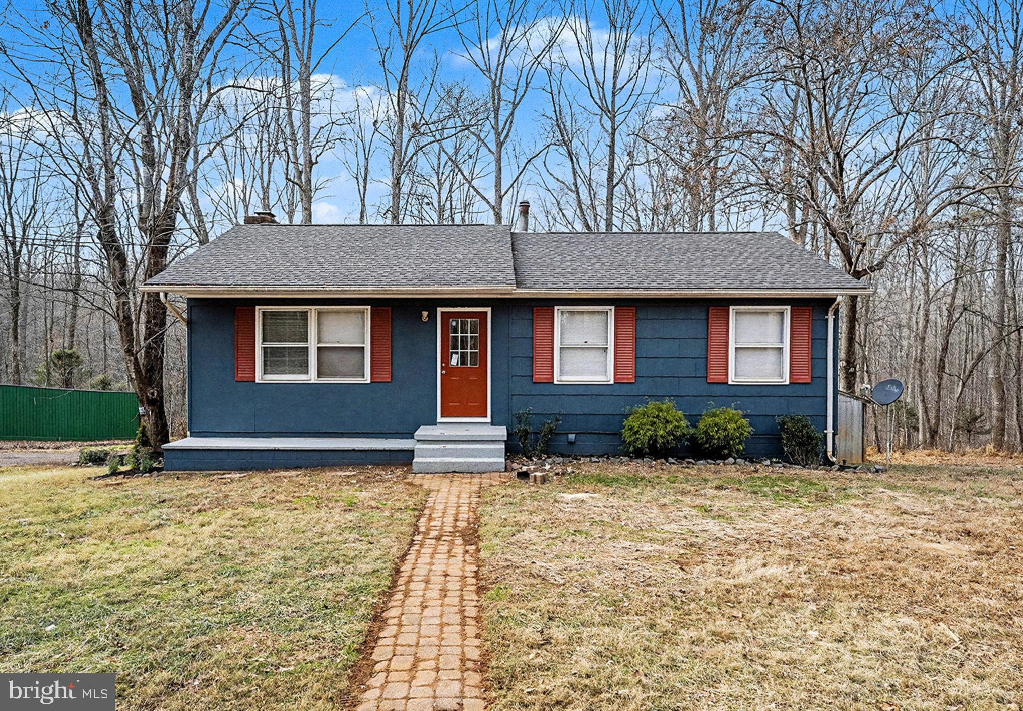 4127 Cabin Road Reva, VA 22735 - Photo 5 of 28 a front view of a house with a yard